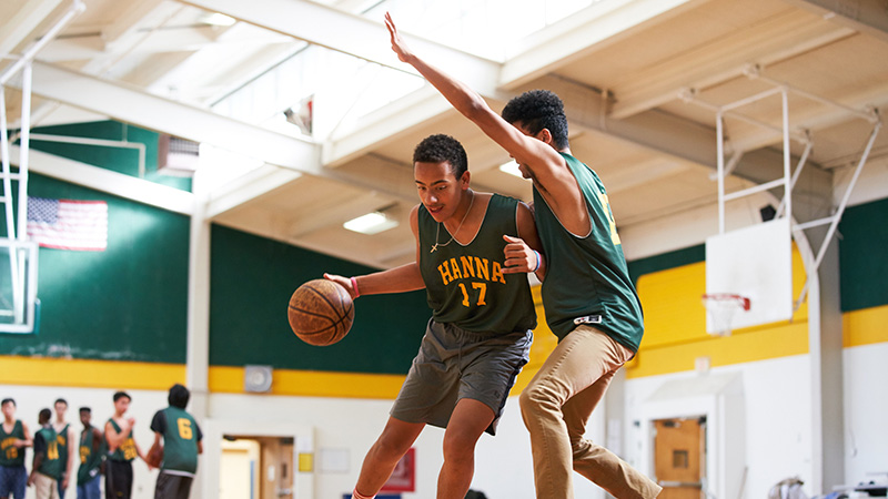 Indoor photo of High School basketball players
